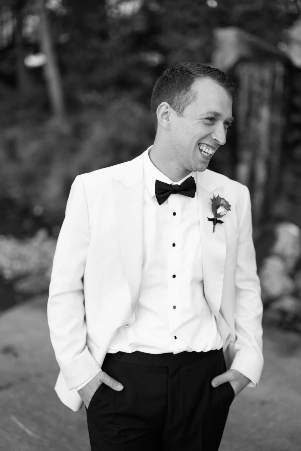 Man in White tuxedo. Photo shot by C.Mae Photography