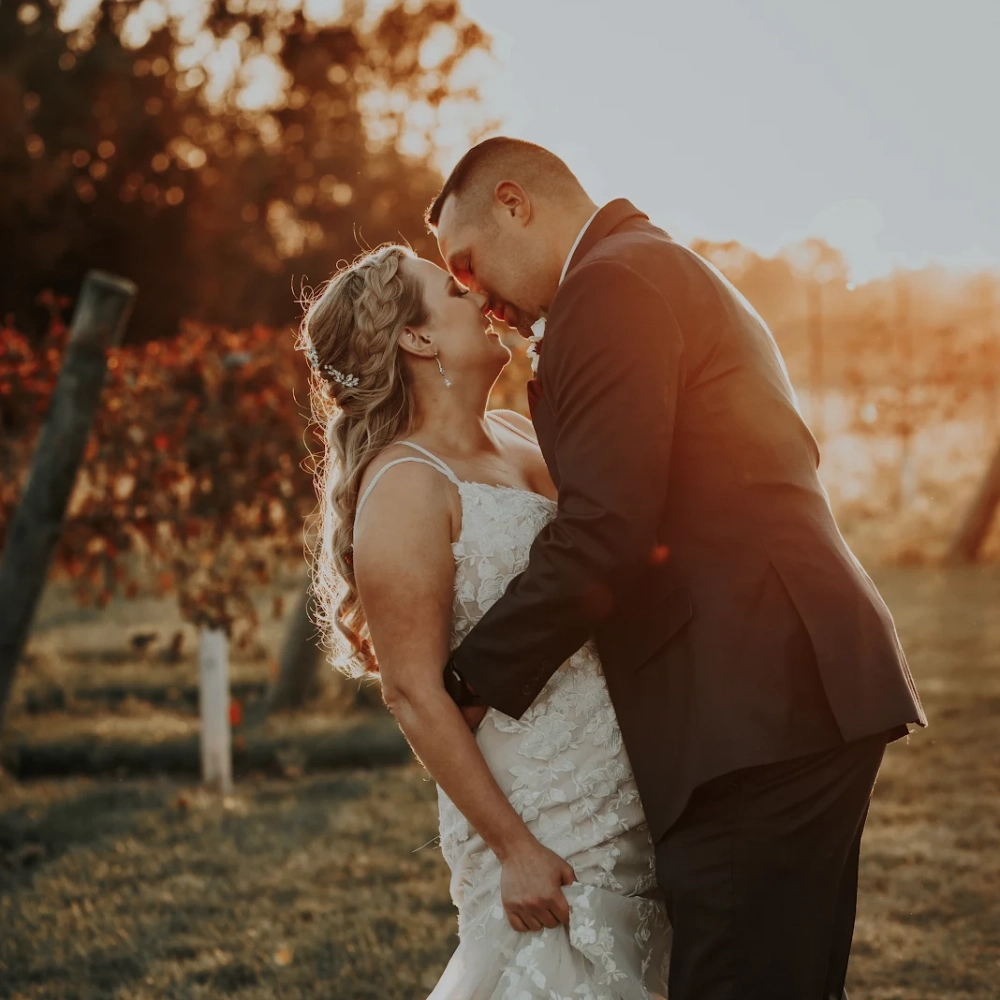 Heidi Rzekowiak wedding kiss.