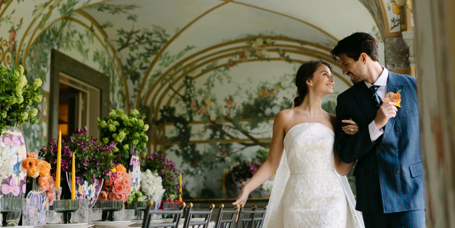 A newly wed couple in an old victorian room. Photo shot by C.Mae Photography.